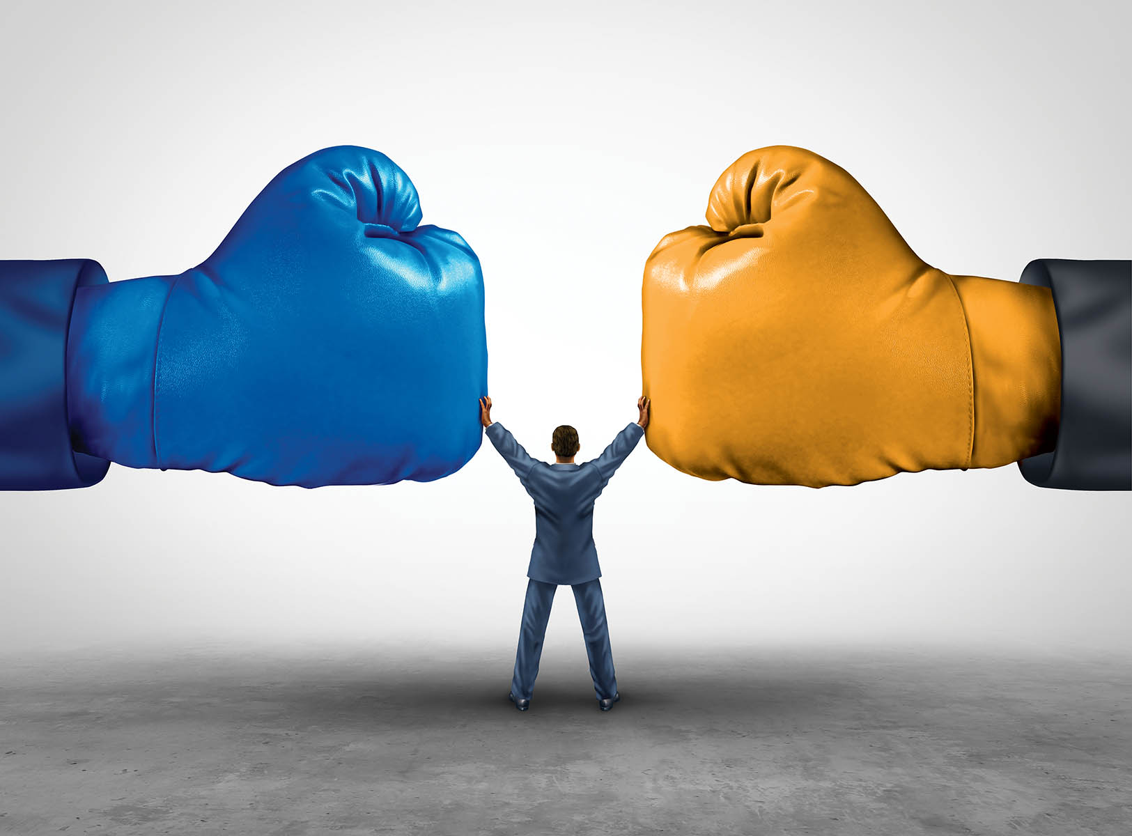 Mediate and legal mediation business concept as a businessman or person separating two boxing glove opposing competitors as an arbitration success symbol for finding common interests to lawfully solve a conflict.